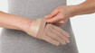 One person wears a glove with an integrated Juzo Silon®-TEX