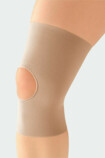 Genou portant JuzoFlex Genu 303 avec rotule ouverte en couleur Beige