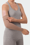 Woman using Juzo ScarPad on the arm